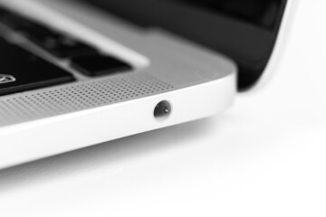 Laptop headphone jack close-up. Modern 3.5mm jack connection. Technology background photo