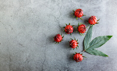 Fresh herbal organic roselle on table