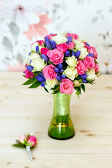 wedding bridal bouquet of roses and gentianas 