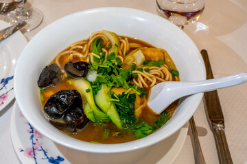 Chinese Noodle Soup with Black Algaes and vegetables, special homemade Soup. High quality photo