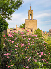 Fototapeta na wymiar Clock tower of the village of Cucuron in the Luberon valley in Provence, France