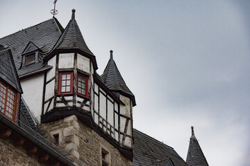 Fototapeta na wymiar Retro roof with window in Germany