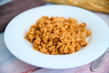 Yellow rice dish with chicken and vegetables