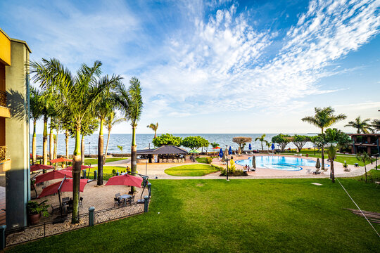 High angle view of the poolside of an upscale hotel resort comlex along the shore of Lake Victoria, Entebbe, Uganda