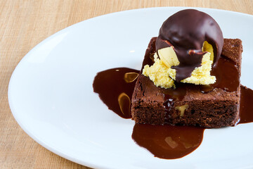 Plate of chocolate coulant and vanilla ice cream