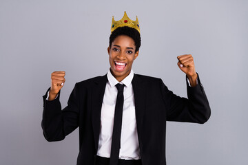 Photo of young excited prince princess celebrate luck triumph fists hands hooray isolated over grey...