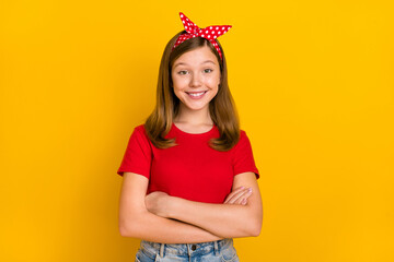 Portrait of sweet cute cheerful little woman with folded hands retro style apparel isolated on yellow color background