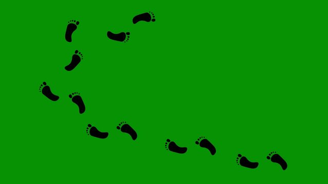 Loop animation of the black silhouette of footsteps, on a green chroma key background