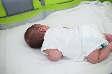 Newborn baby in bed , high quality photo