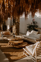 Elegant, modern and contemporary interior and exterior decor details of a chic hotel in Mykonos in...