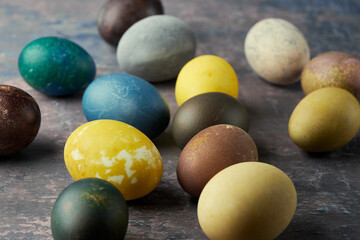 Easter. Naturally colored eggs background. Close up.