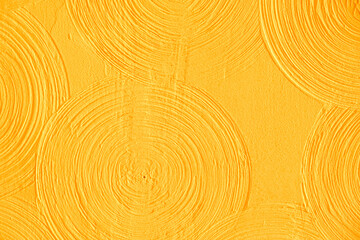 Close-up yellow abstract background gypsum panel, spiral-shaped volumetric, yellow circles, futuristic background, selective focus