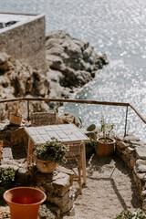 Elegant, modern and contemporary interior and exterior decor details of a chic hotel in Mykonos in Greece
