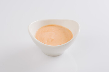 sauce on a white plate on a white background