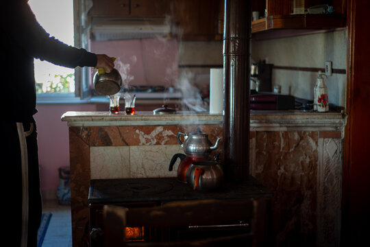 Tea brewed over a traditional stove