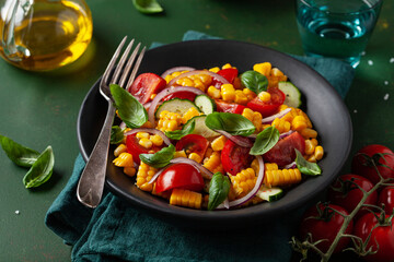 healthy vegetarian tomato sweet corn salad with cucumber and basil