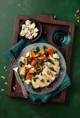chicken breast with sweet potato, blue cheese and kale. healthy lunch