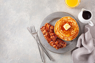 sweet pancakes with butter and bacon. traditional american breakfast