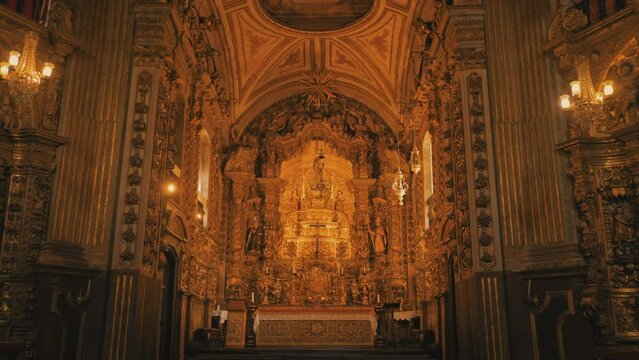 Woman visiting the Nossa Senhora do Pilar Minor Basilica in Ouro Preto, Minas Gerais