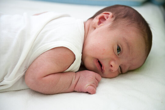 Newborn baby in bed , high quality photo