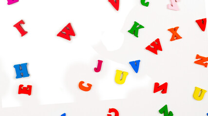 Multicolored letters isolated on a white background.