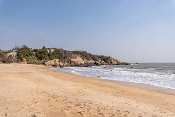 Fototapeta na wymiar Beaches, waves and stones by the sea