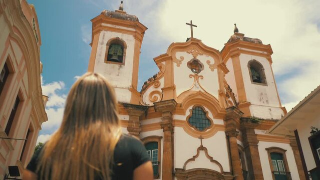 Woman visiting the Nossa Senhora do Pilar Minor Basilica in Ouro Preto, Minas Gerais