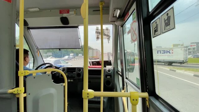 Passengers in the bus inside view in Barnaul, Russia.