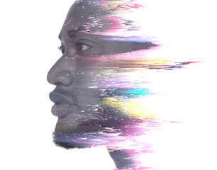 A double exposure portrait of an attractive man combined with digital art.