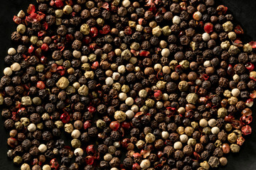 Close up view of mixed peppercorn seeds