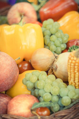 Fresh fruits and vegetables in basket as ingredients for cooking containing healthy vitamins