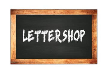 Obraz premium LETTERSHOP text written on wooden frame school blackboard.