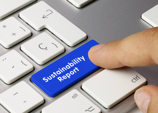 Sustainability Report - Inscription on Blue Keyboard Key.