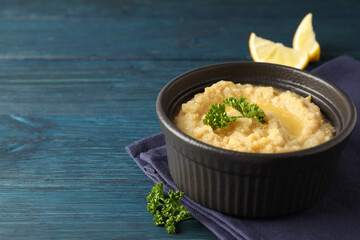 Concept of tasty food with hummus, space for text