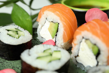 Concept of tasty food with sushi rolls, close up