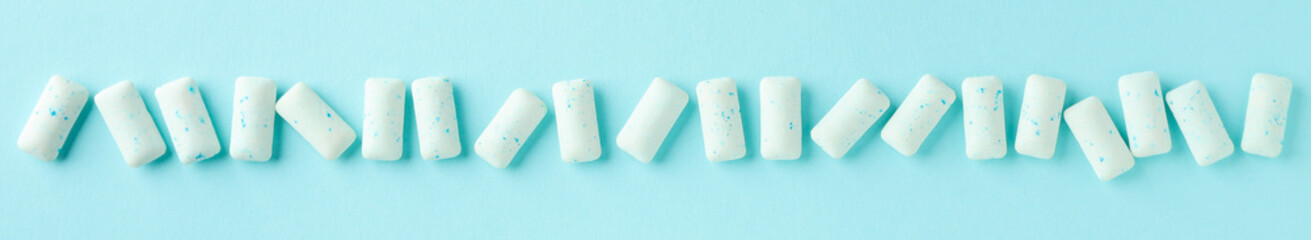 Chewing or bubble gum on blue background