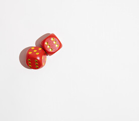 Two red dices on white background. Fortune, risk or game concept.