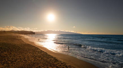 Fototapeta na wymiar Scenic view of seashore in sunset