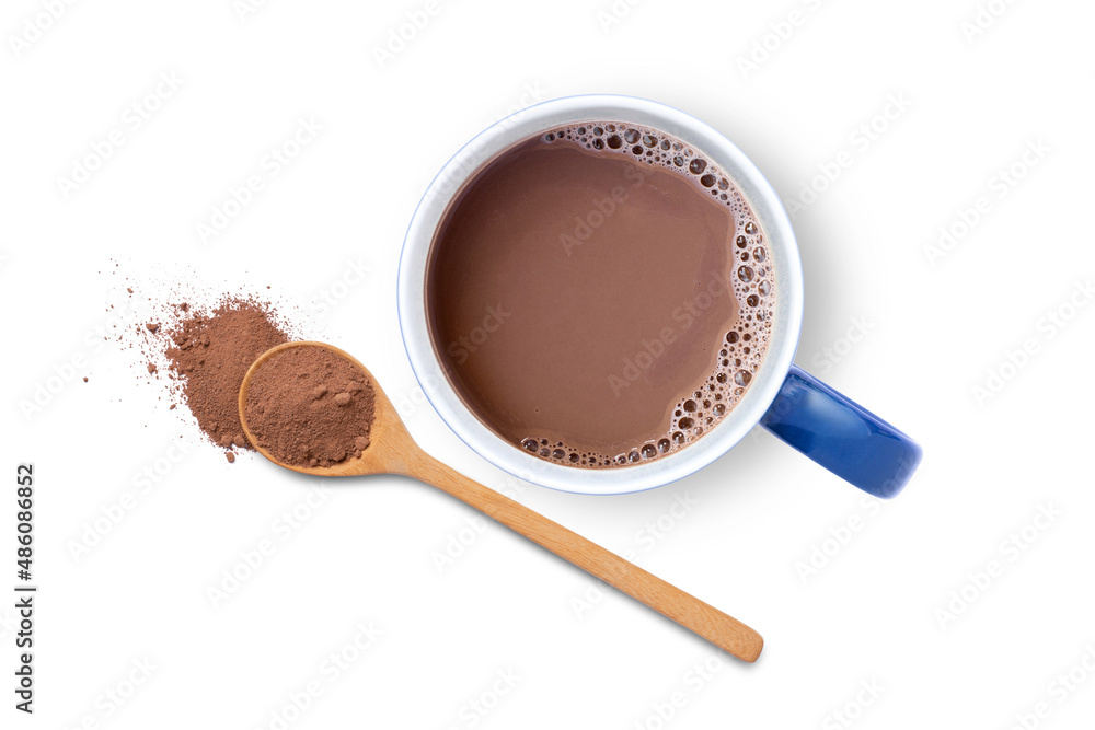 Wall mural Hot chocolate cocoa drink in blue ceramic mug with cocoa powder in wooden spoon isolated on white background. Top view. Flat lay.