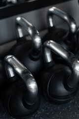 Dumbbells on the dumbbell rack in the gym.
