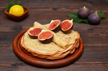 beautiful still life with pancakes and figs