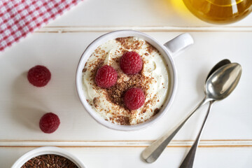 Cottage cheese blended with flax seed oil on white background, top view