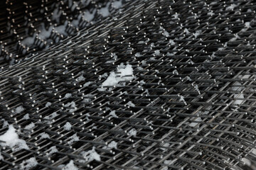 Fototapeta premium Rebar, reinforcing bars or steel close up, reinforcement steel, wires mesh of steel used as a tension device in reinforced concrete