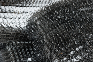 Metal mesh or lattice for quick fencing of the territory. Wholesale building store. Background