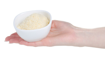Bowl with grated cheese in hand on white background isolation