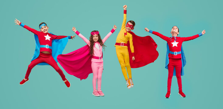 Little Superheroes Pretending To Fly