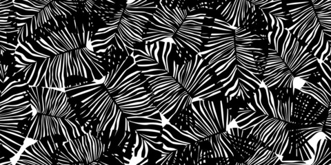 Monochrome tropical palm leaves seamless pattern. Black and white exotic botanical texture.