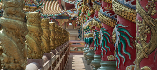 Chonburi, Thailand - 05 Feb 2022 :  Panoramic of  Sculptured dragons pillars and corridor in...
