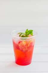 Lemonade citrus non-alcoholic cocktails white wooden background.