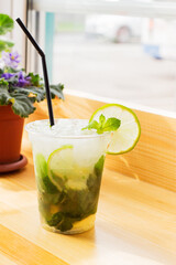 Lemonade citrus mint nonalcoholic white wooden background